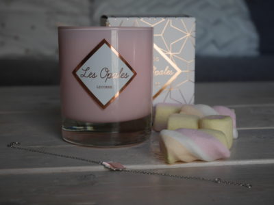 candle with jewelry